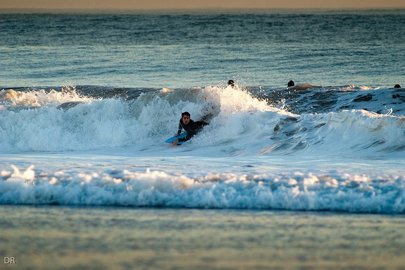 Surfer on a wave in Portugal